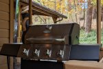 The gas grill has it`s own covered deck, convenient to the kitchen and living space